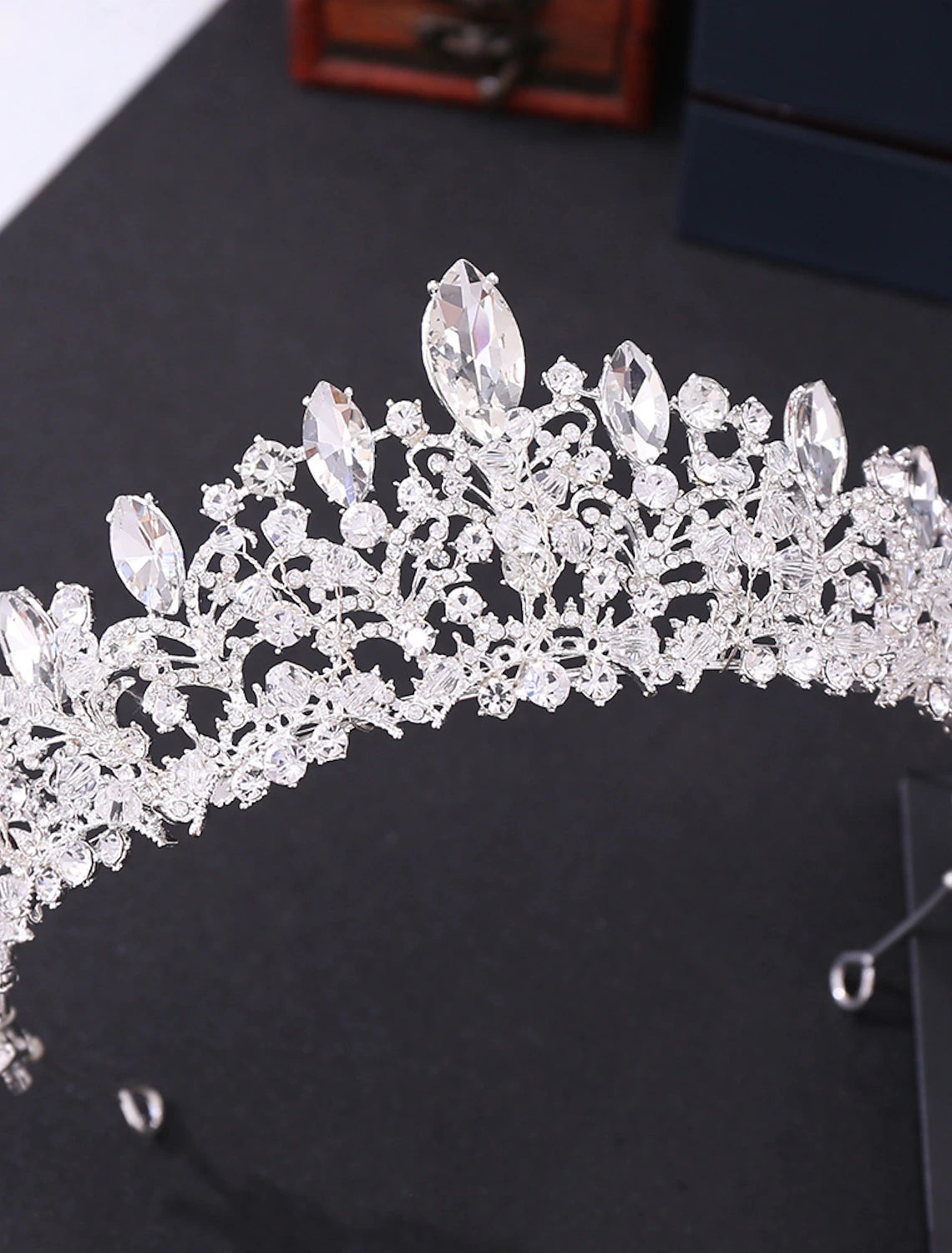 Elegant wedding crown tiara with intricate metal trim.