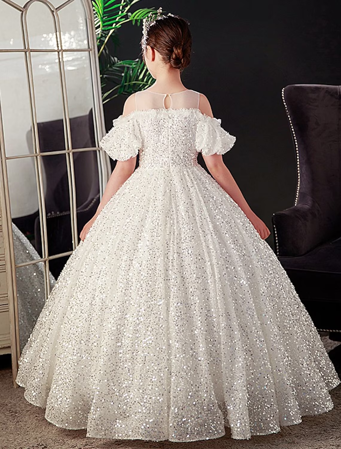 Side view of the white short sleeve mid-calf party dress.