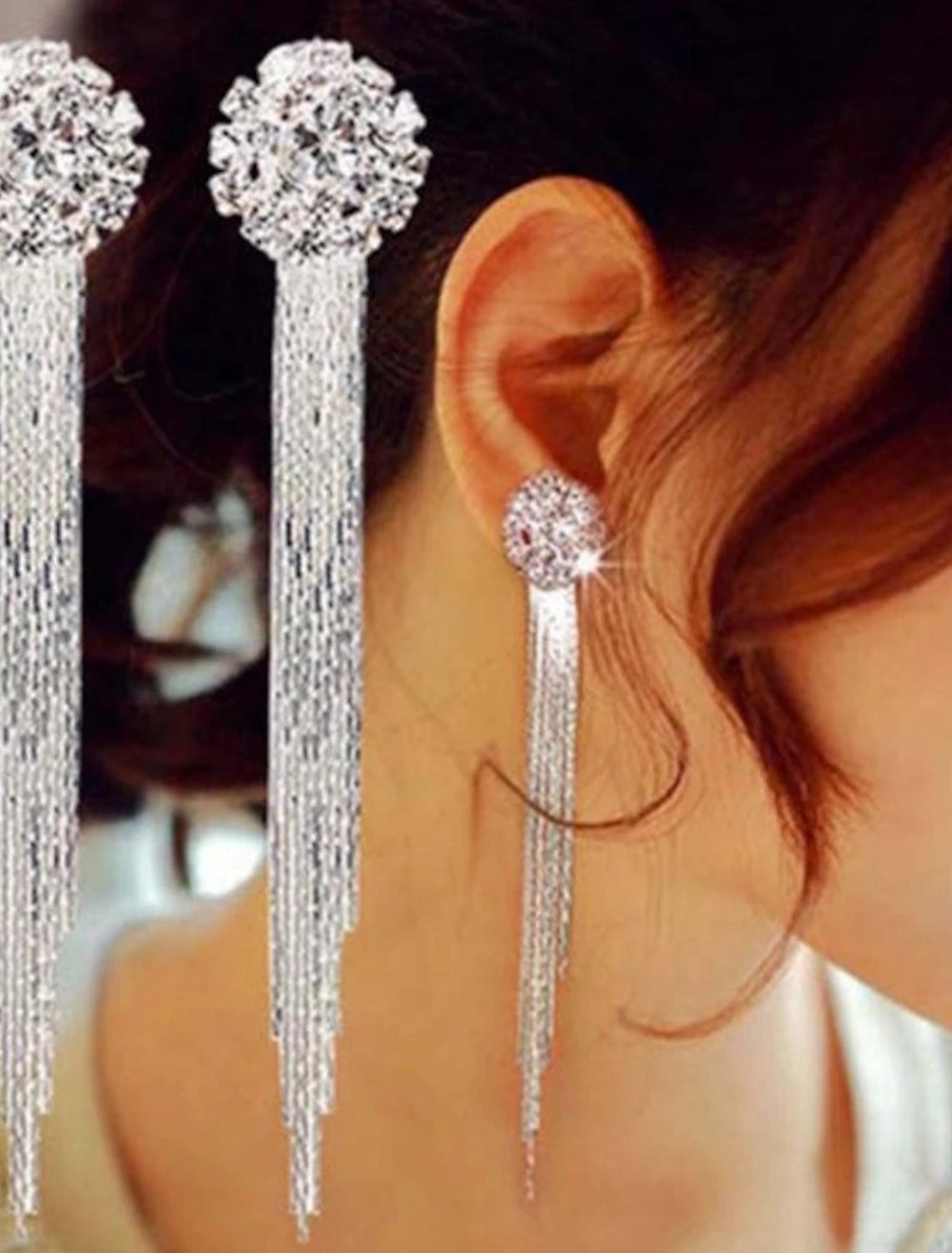 Three pairs of white tassel fringe drop earrings displayed.
