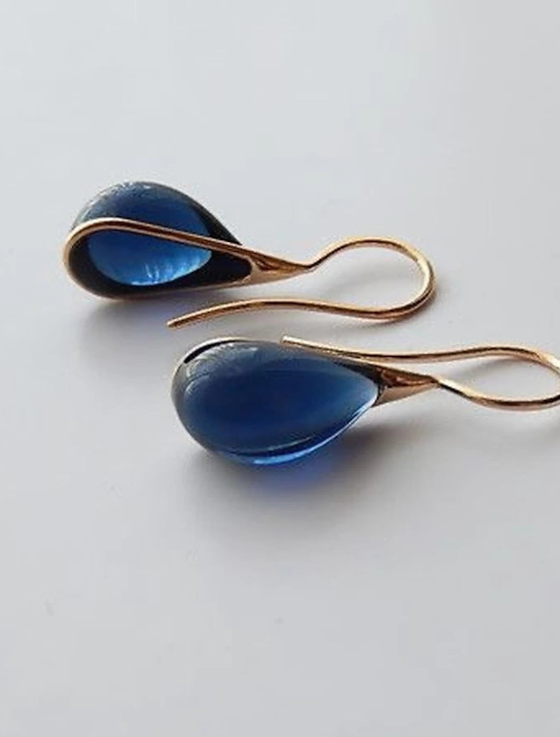 Stylish fine jewelry drop earrings.