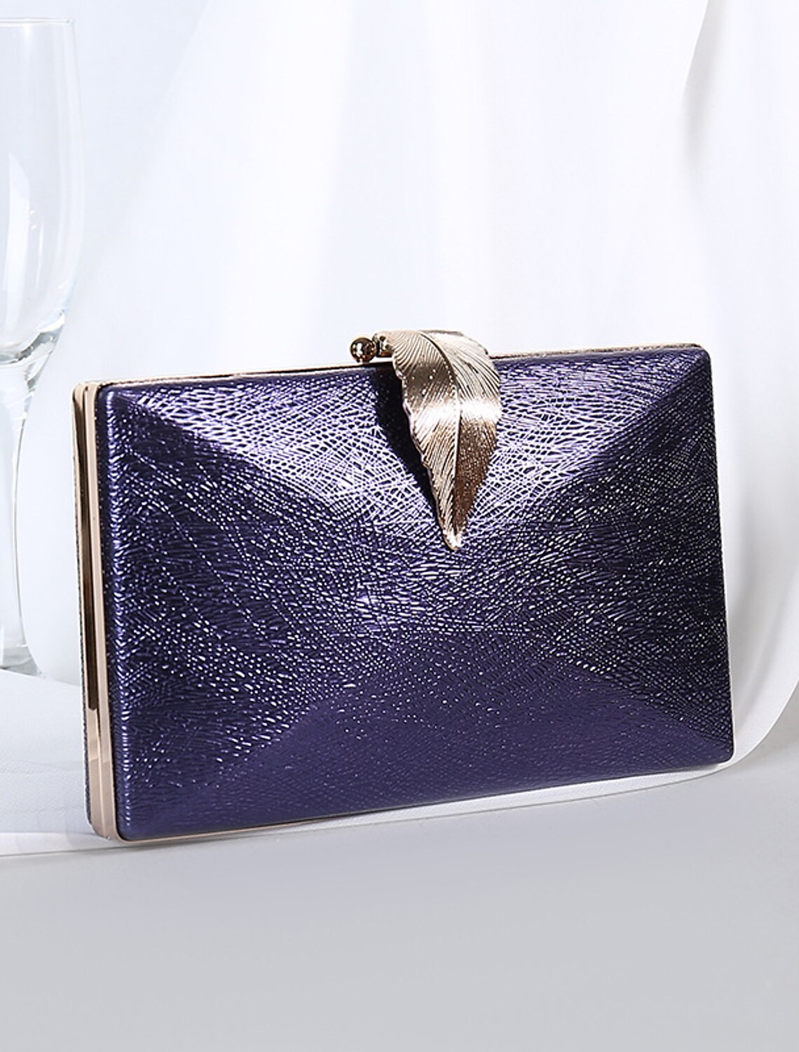 Women's evening clutch bag, showcasing its sleek design for formal events.