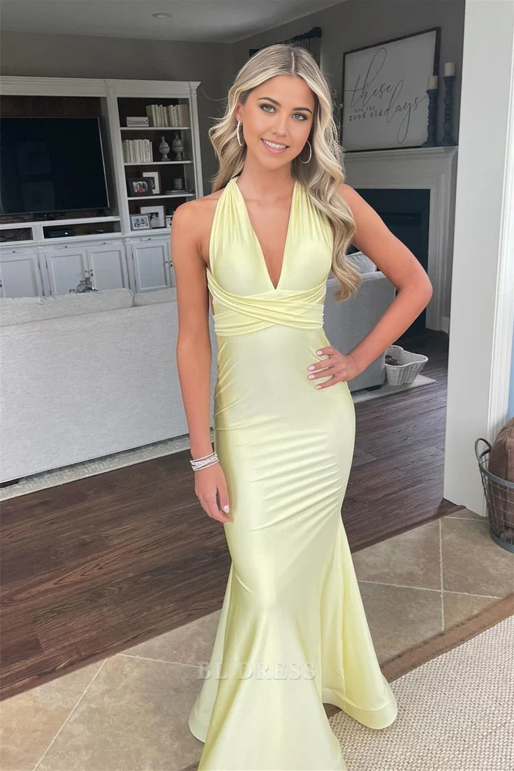 Elegant yellow mermaid V-neck formal dress with an open back.