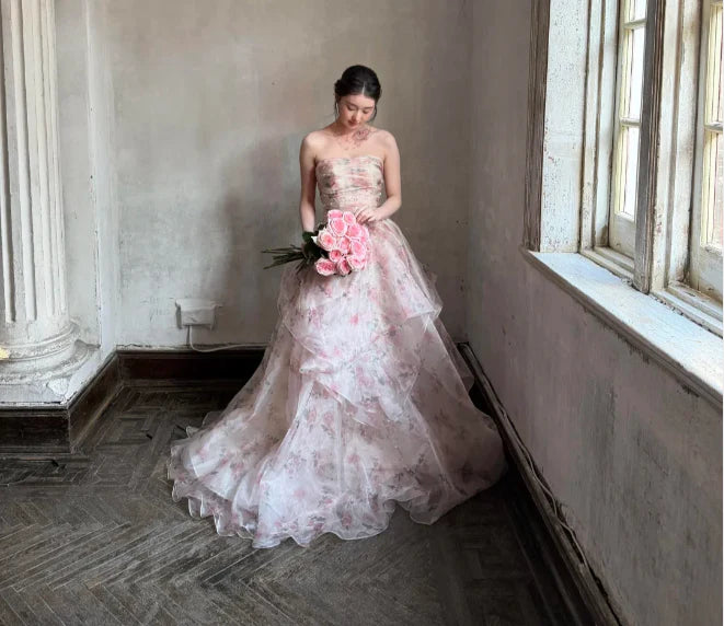 Elegant Blush Pink Strapless Prom Dress With Floral Print Tiered Tulle Skirt And Beaded Bodice For Formal Evening Party