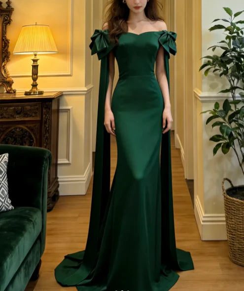 Elegant Emerald Green Off Shoulder Prom Dress With Bow Accents And Mermaid Train For Formal Evening Party
