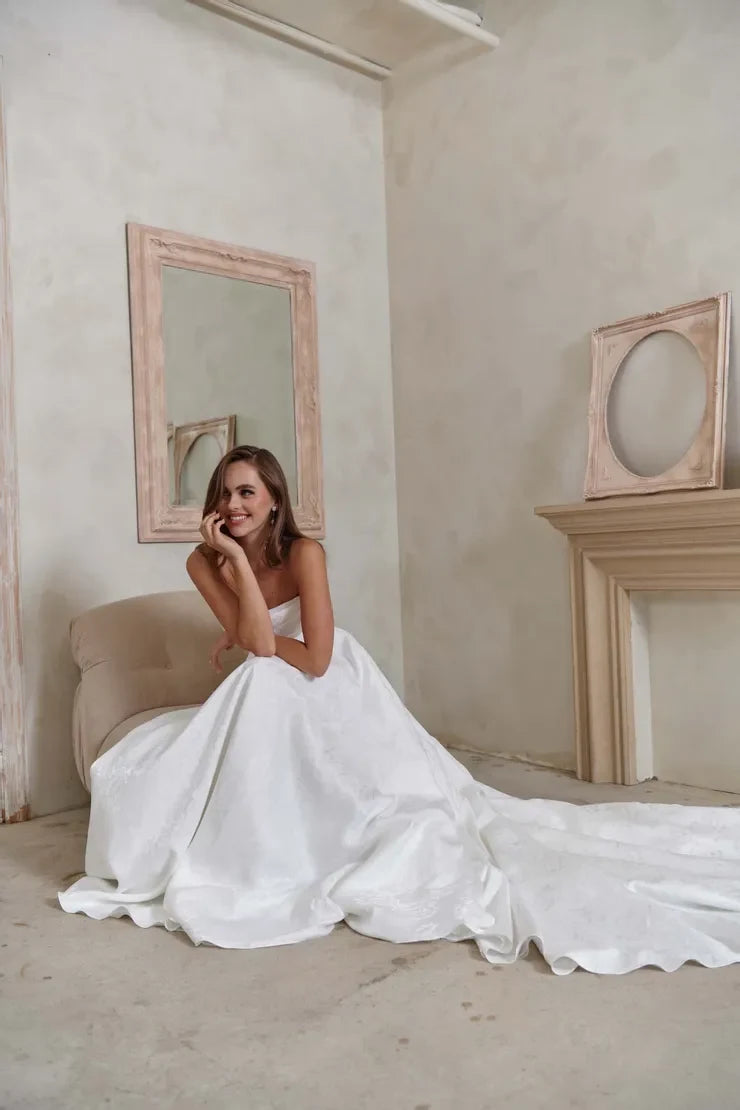 Elegant A-Line Draped Strapless Corset White Floor-Length Wedding Gown