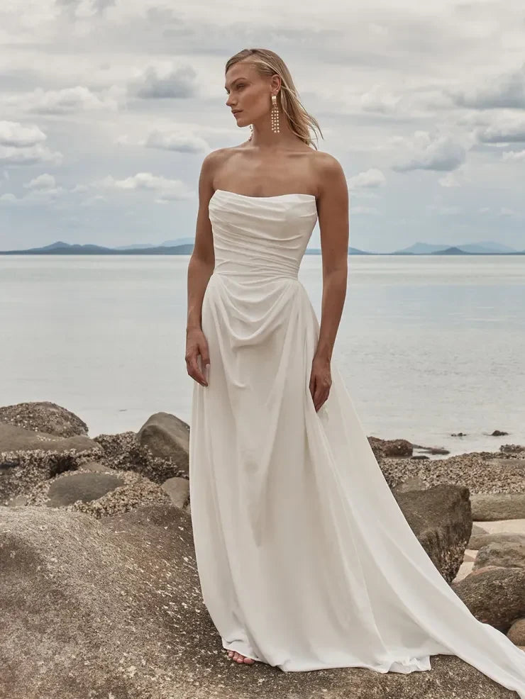 Elegant A-Line Strapless Draped Modern Ivory Floor-Length Wedding Gown
