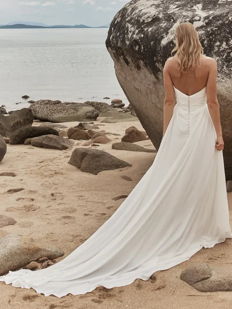 Elegant A-Line Strapless Draped Modern Ivory Floor-Length Wedding Gown