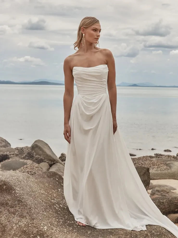 Elegant A-Line Strapless Draped Modern Ivory Floor-Length Wedding Gown