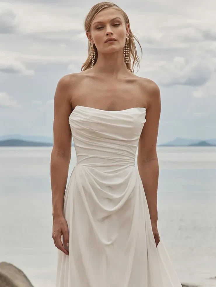 Elegant A-Line Strapless Draped Modern Ivory Floor-Length Wedding Gown