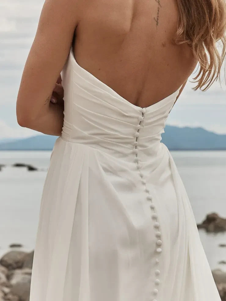 Elegant A-Line Strapless Draped Modern Ivory Floor-Length Wedding Gown