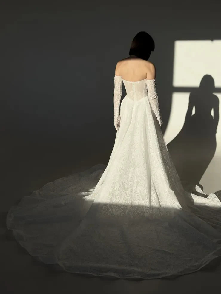Elegant A-Line Strapless Lace Beaded White Floor-Length Wedding Gown