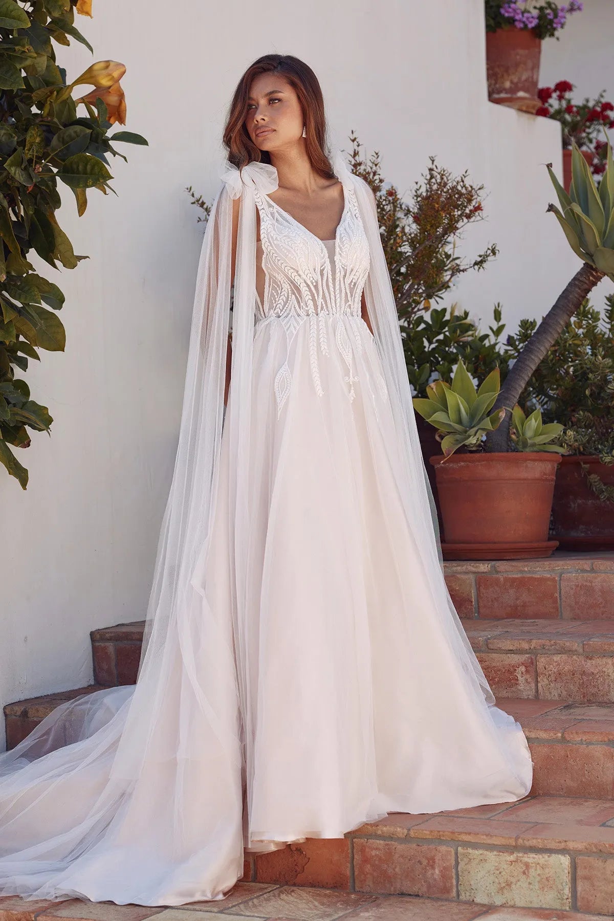 Elegant A-Line V-Neck Sleeveless Applique Flowy Ivory Floor-Length Prom Gown