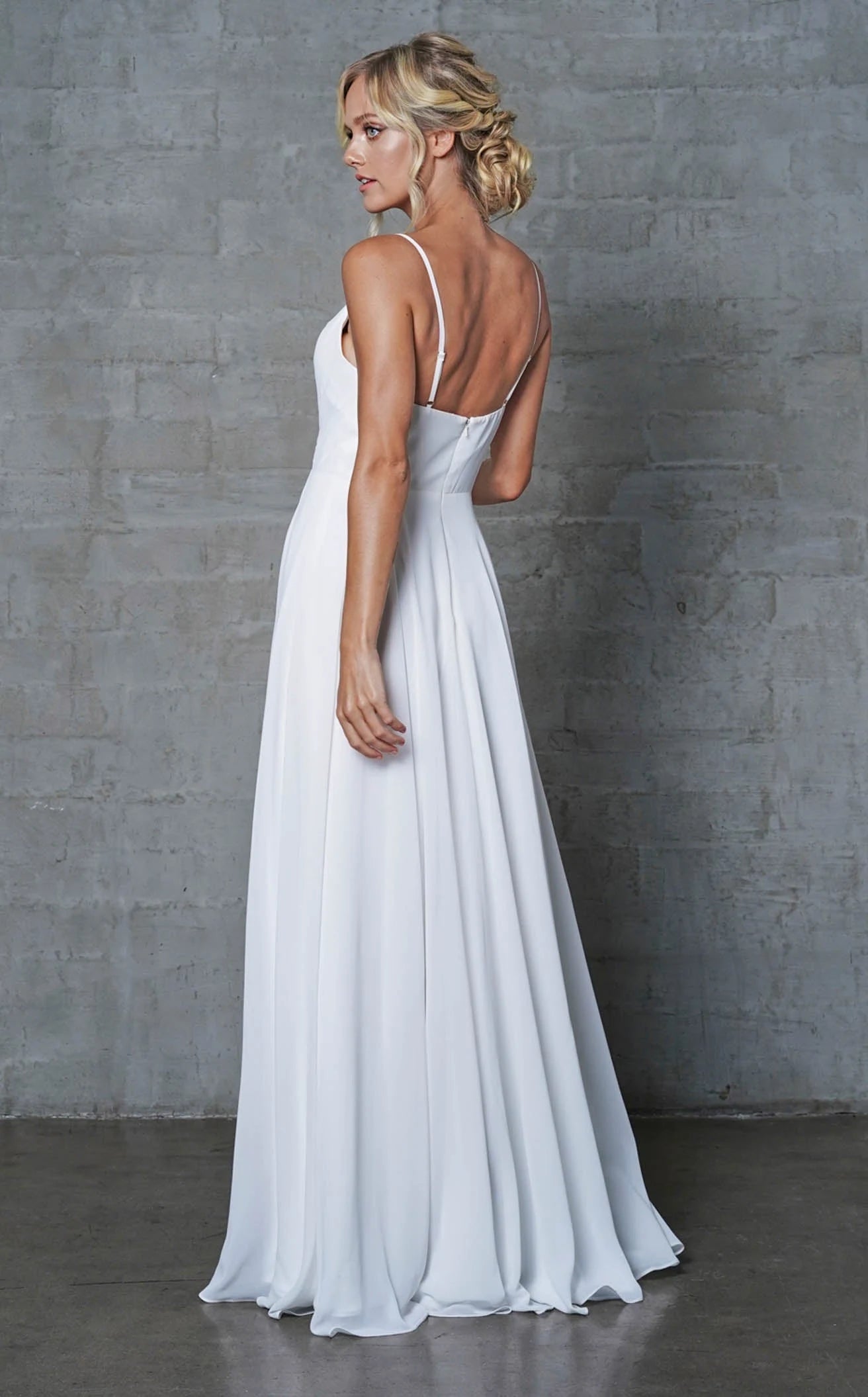Elegant A-Line V-Neck Sleeveless Pleated High Slit White Floor-Length Prom Gown
