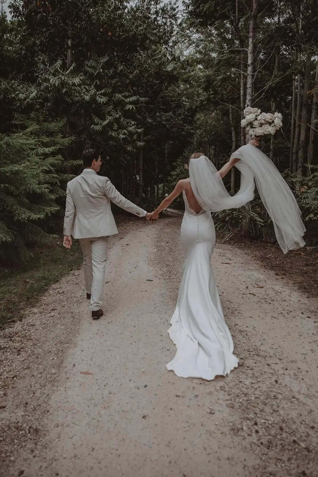 Elegant Illusion Mermaid Deep V-Neck Sleeveless Backless Ivory Chapel Wedding Gown