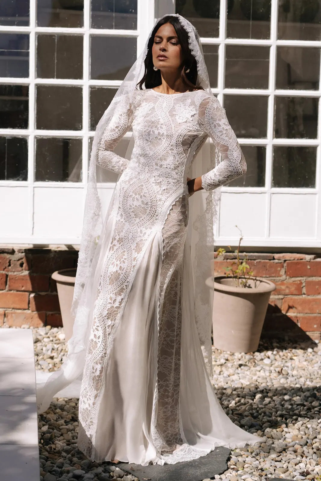 Elegant Sheath Bateau Long Sleeve Lace Open Back Ivory Floor-Length Wedding Gown