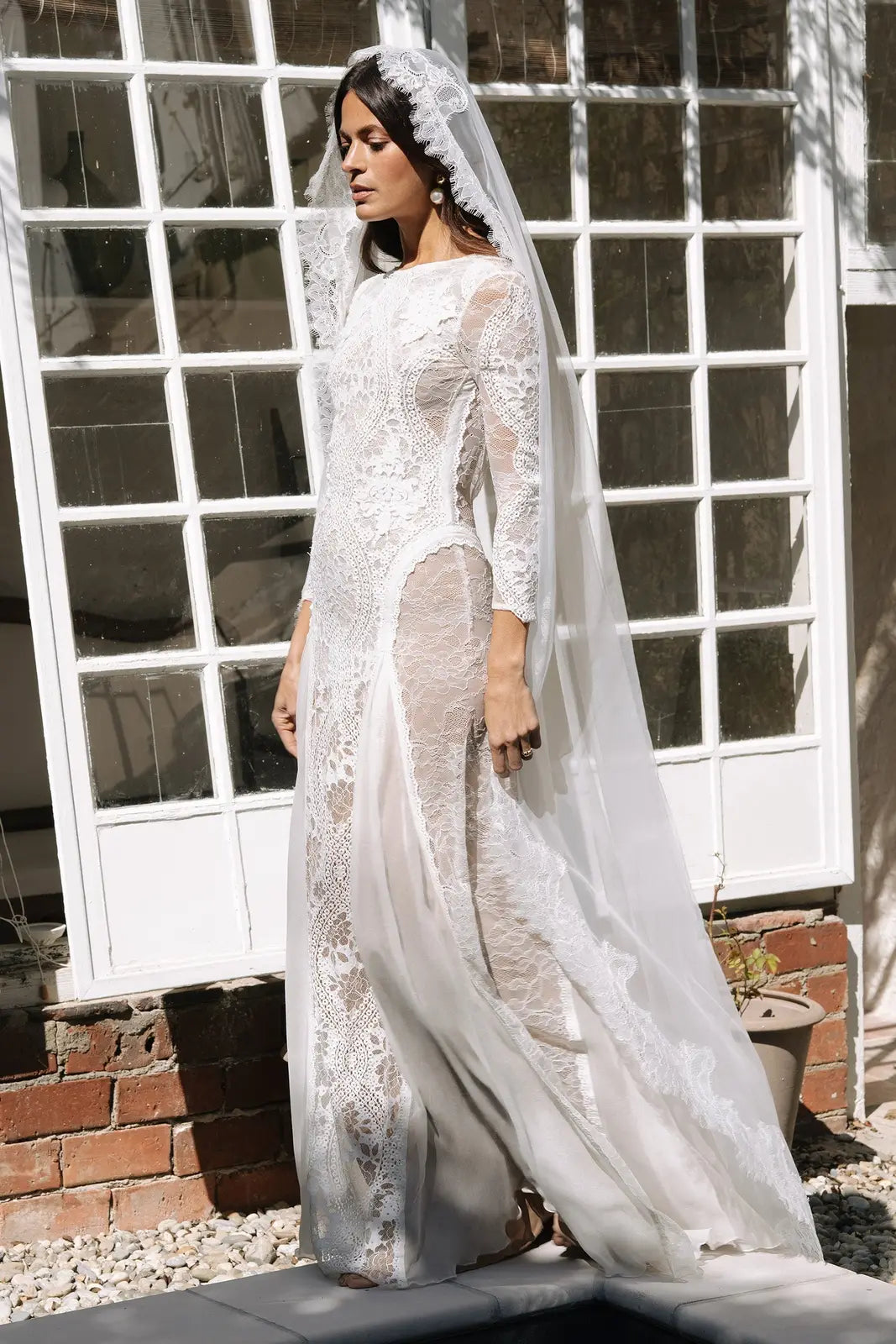 Elegant Sheath Bateau Long Sleeve Lace Open Back Ivory Floor-Length Wedding Gown