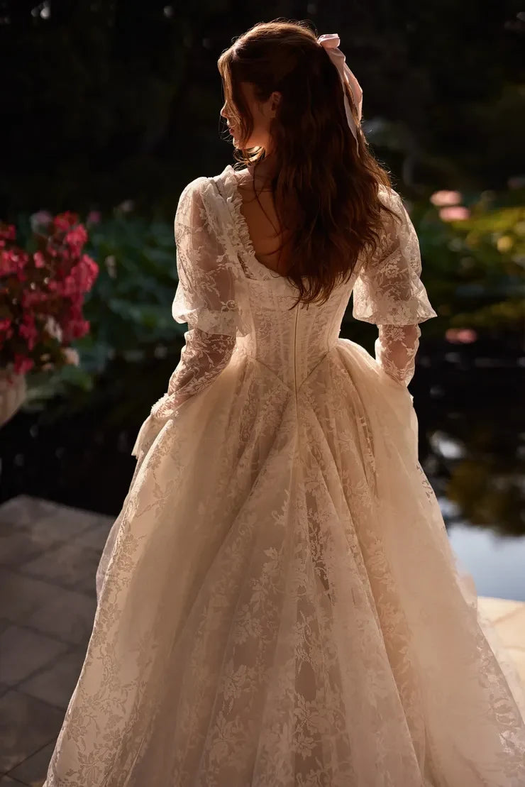 Ethereal A-Line Off-Shoulder Long Sleeve Ruffled Lace High-Low Ivory Wedding Dress
