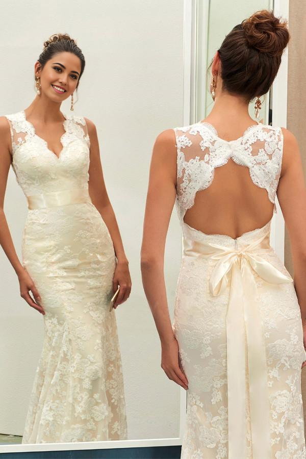Back view of V-neck lace mermaid sheath wedding gown with sashes.