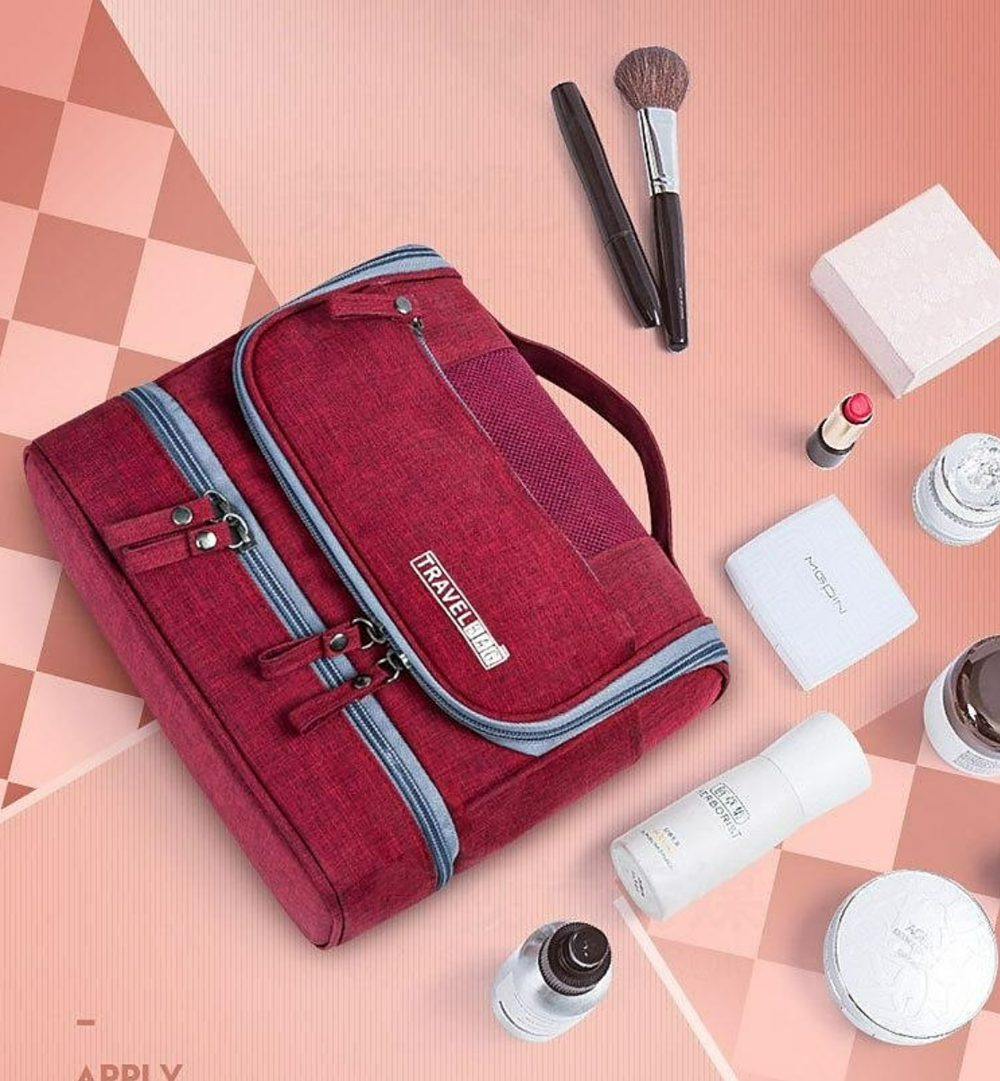 Hanging toiletry bag with multiple compartments open.