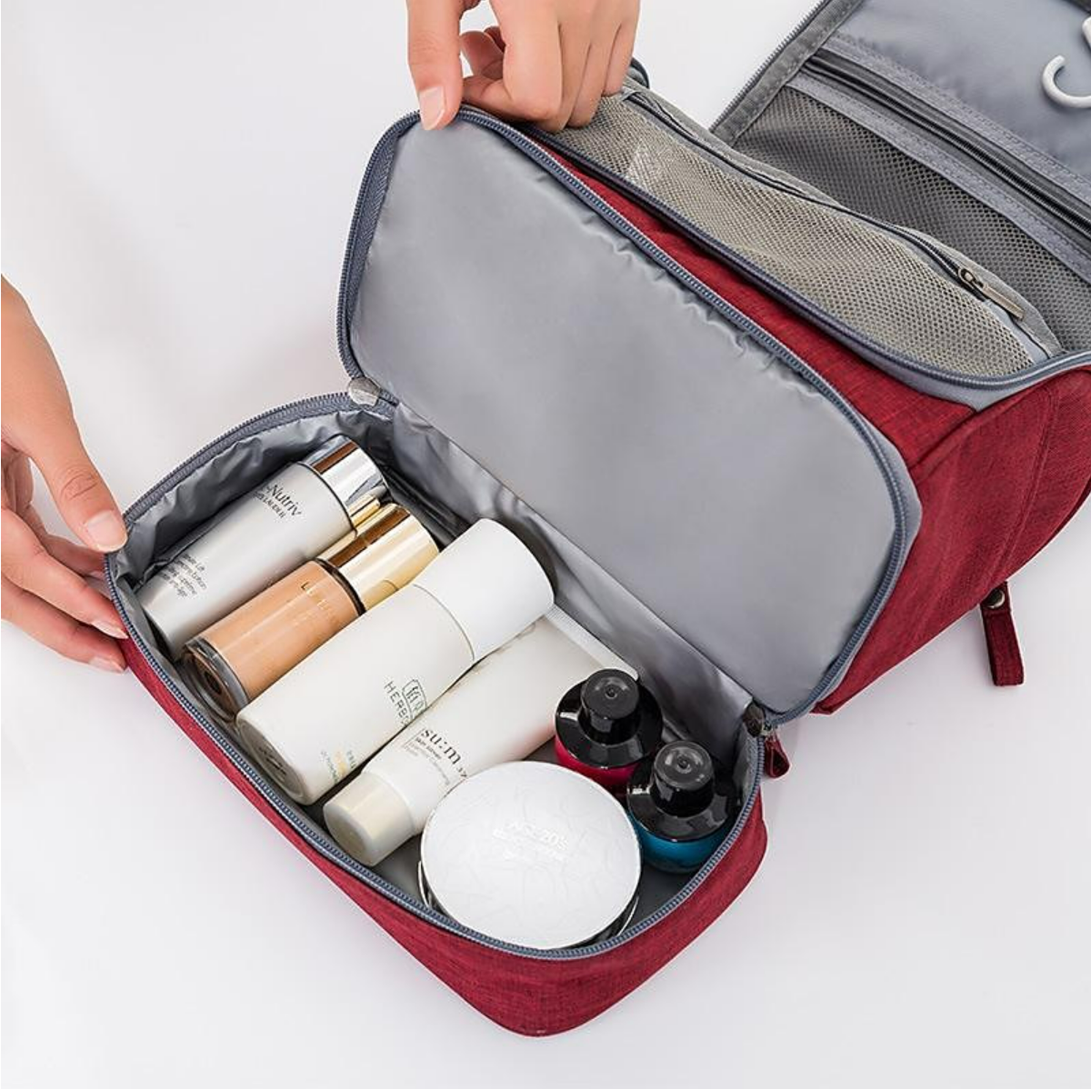 Toiletry bag with sturdy metal hook, ready to hang.