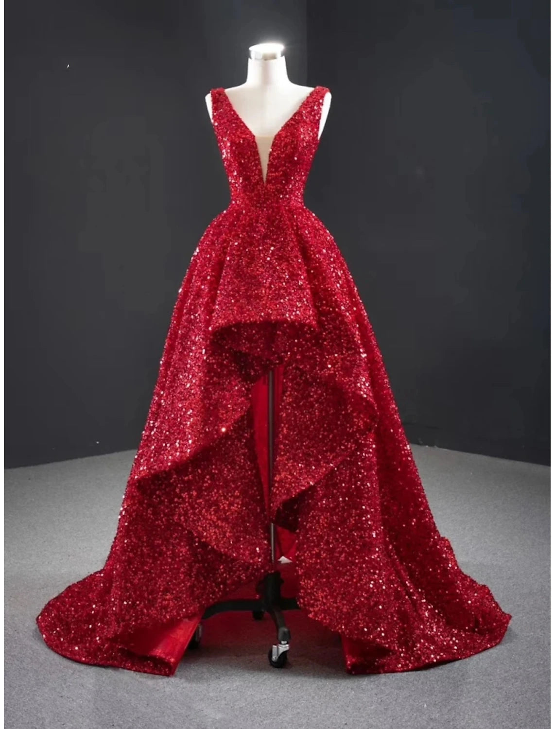 Elegant A-line V-neck sequined red evening gown with a sweep train.