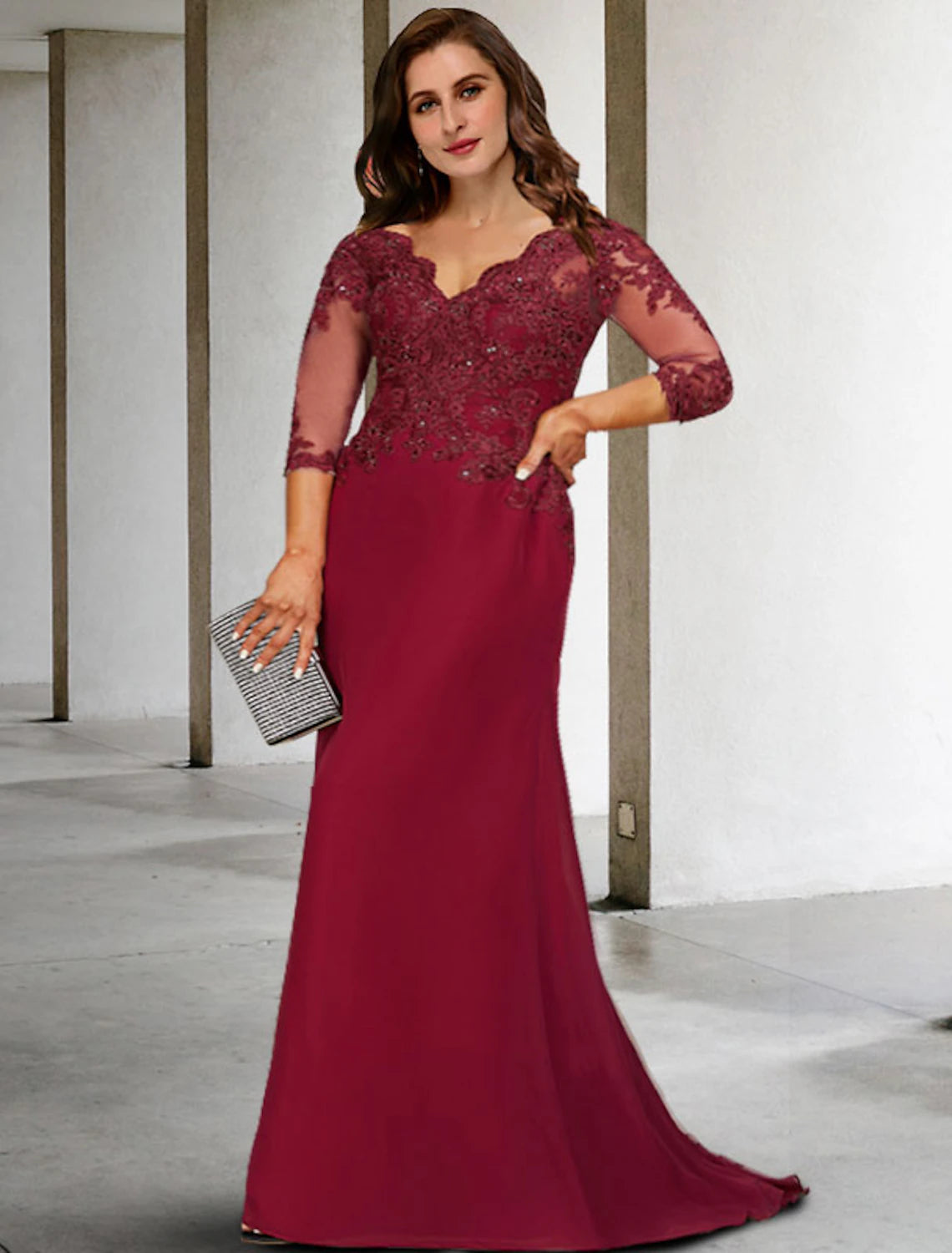 Elegant A-line Mother of the Bride dress with V-neck and 3/4 sleeves.
