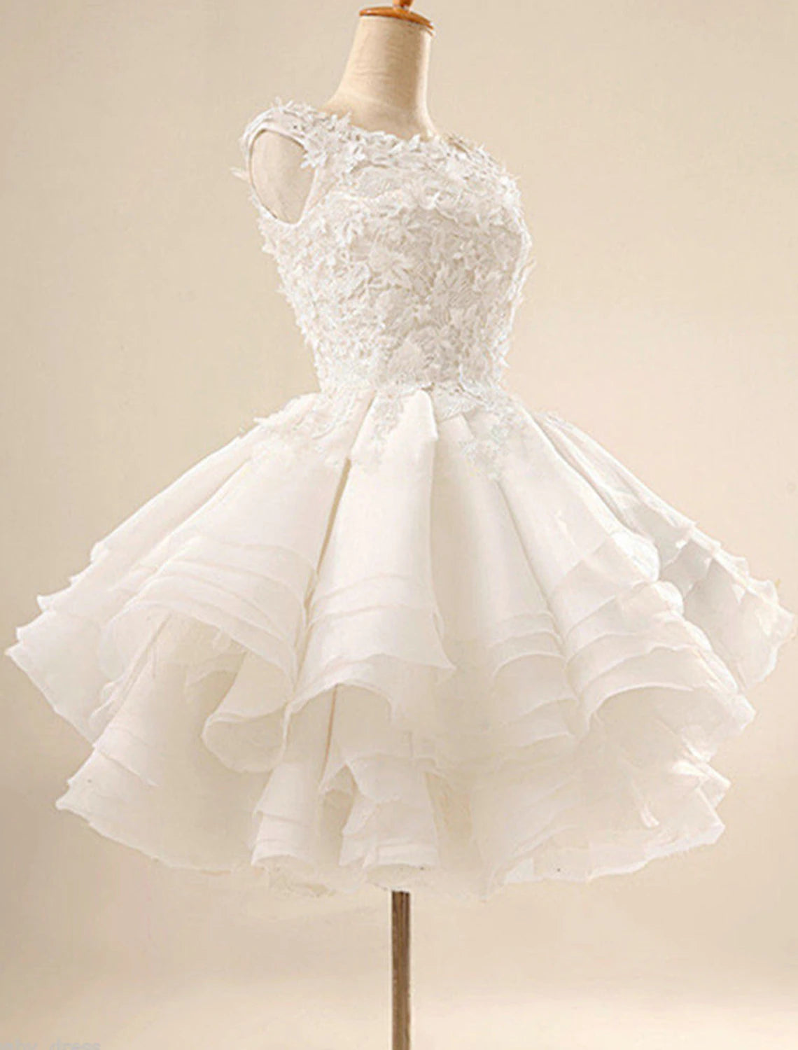 White floral puffy ball gown with jewel neck.