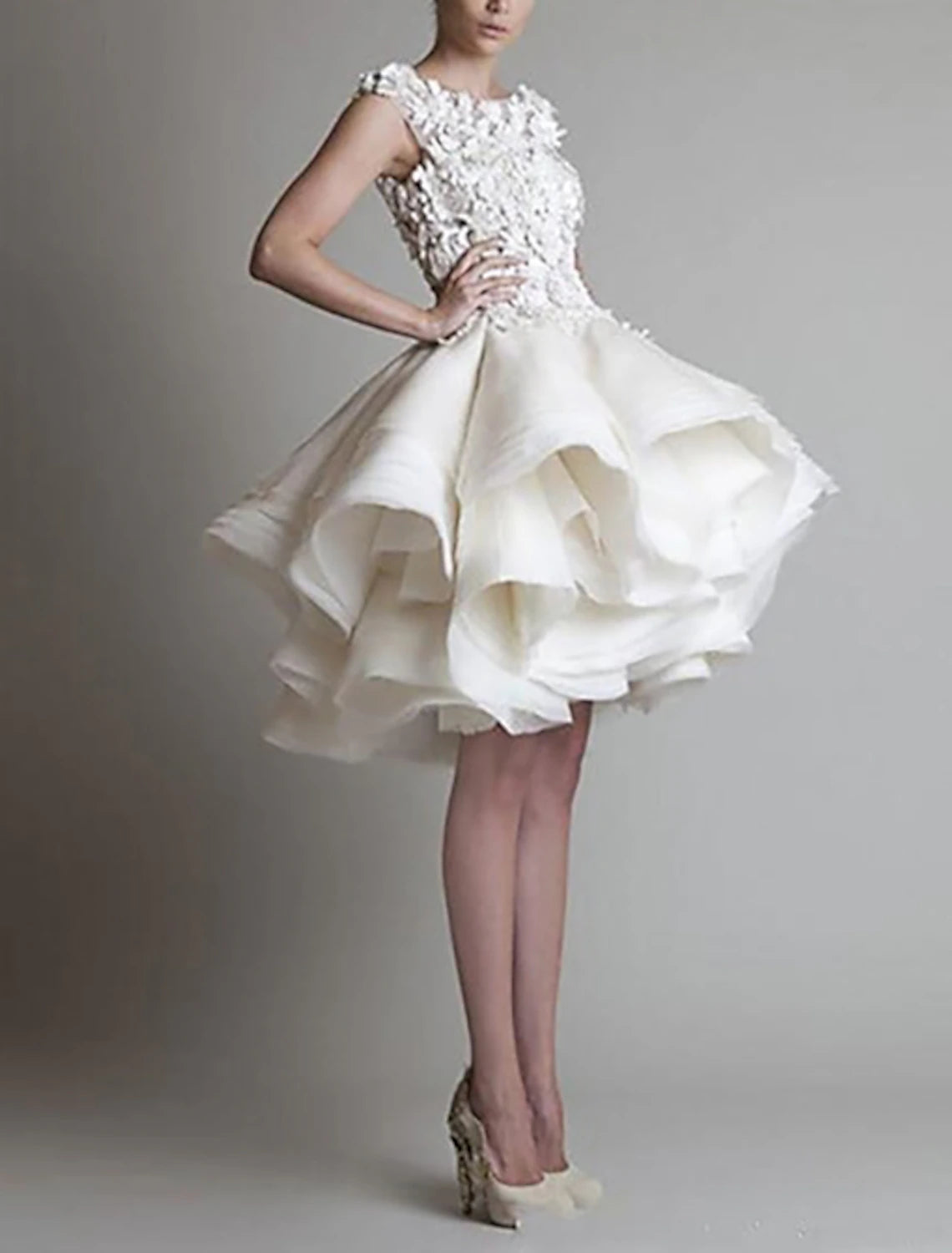 Full view of white puffy homecoming dress.