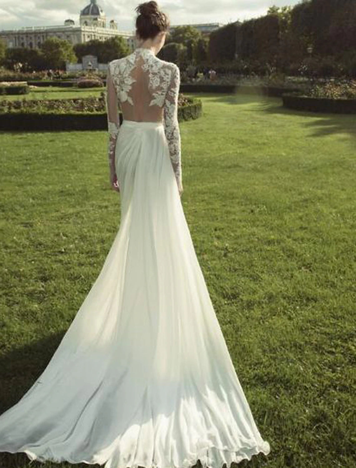 Side profile of the A-line high neck long sleeve chiffon wedding gown, highlighting its silhouette.