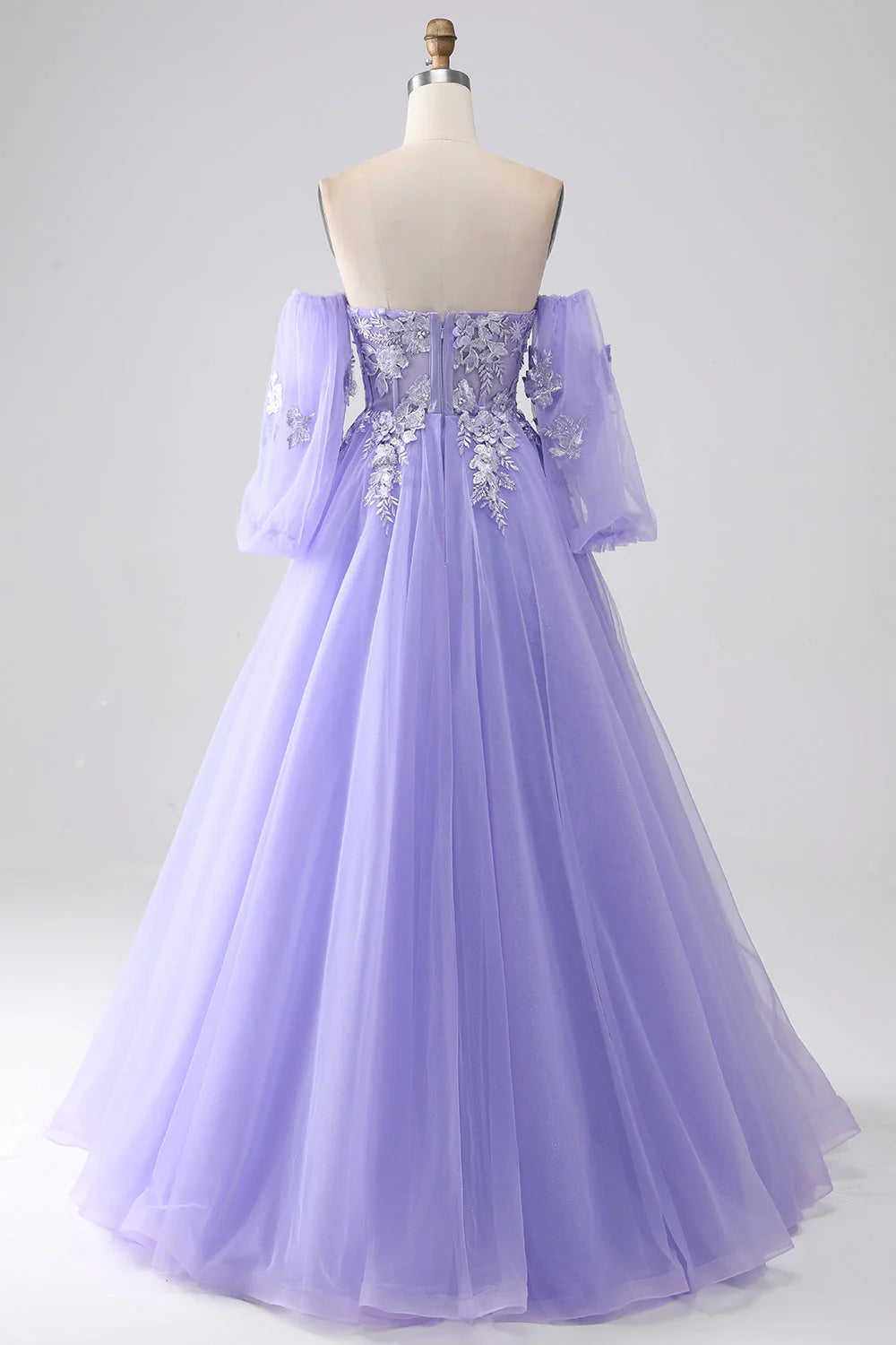 Side view of lavender A-line strapless tulle prom dress.