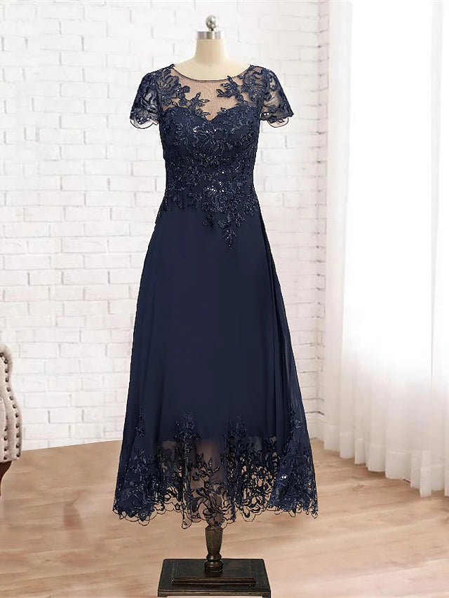 Elegant A-Line Mother of the Bride dress with scoop neck, lace, and 3/4 sleeves.