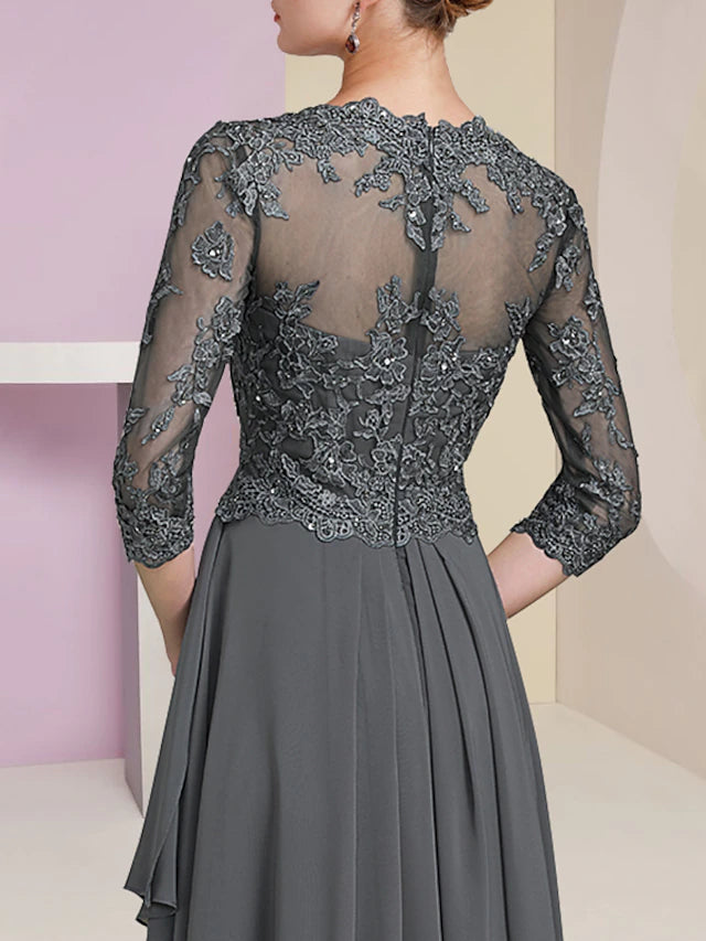 Close-up of the lace and beading details on the half sleeve of the A-line Mother of the Bride dress.