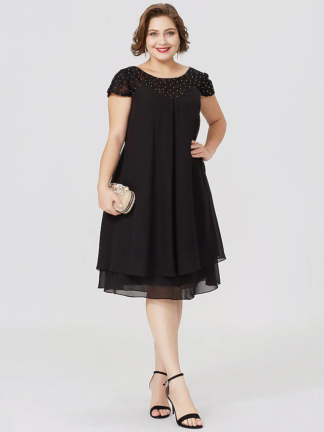 Elegant black sheath Mother of the Bride dress with jewel neck and short sleeves.