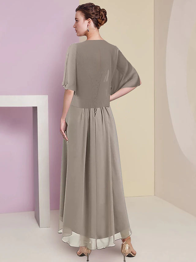 Model wearing the high-low formal dress, showcasing the included matching wrap.