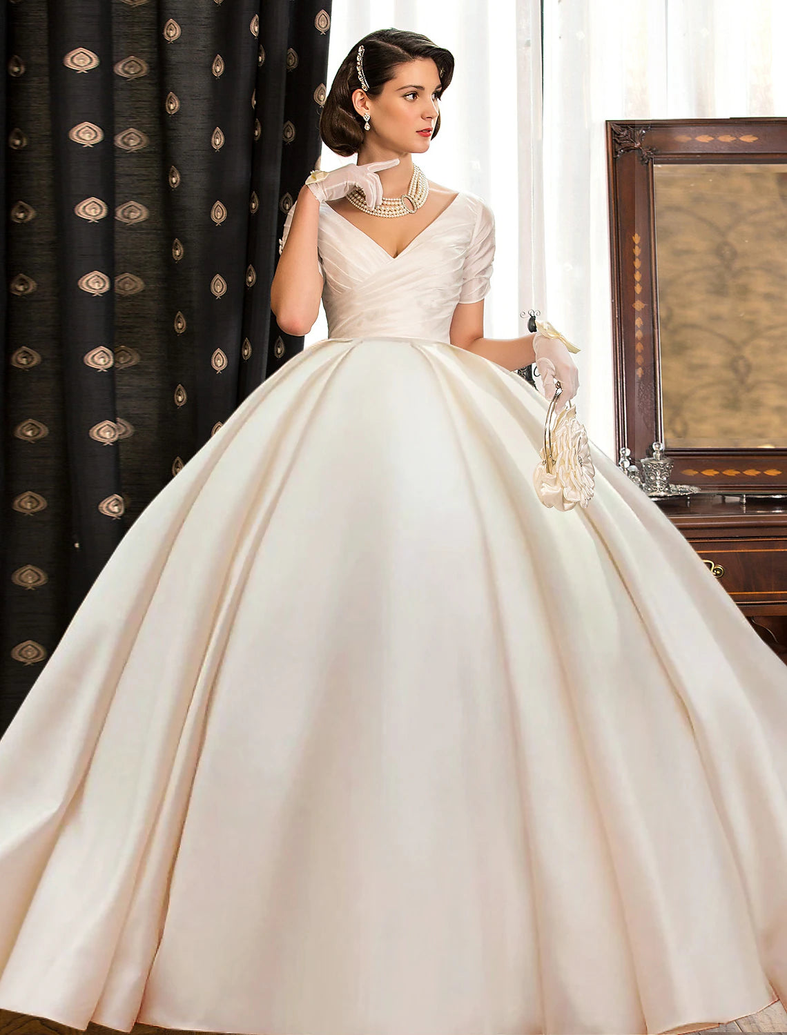 Elegant V-neck short sleeve ball gown wedding dress with court train.