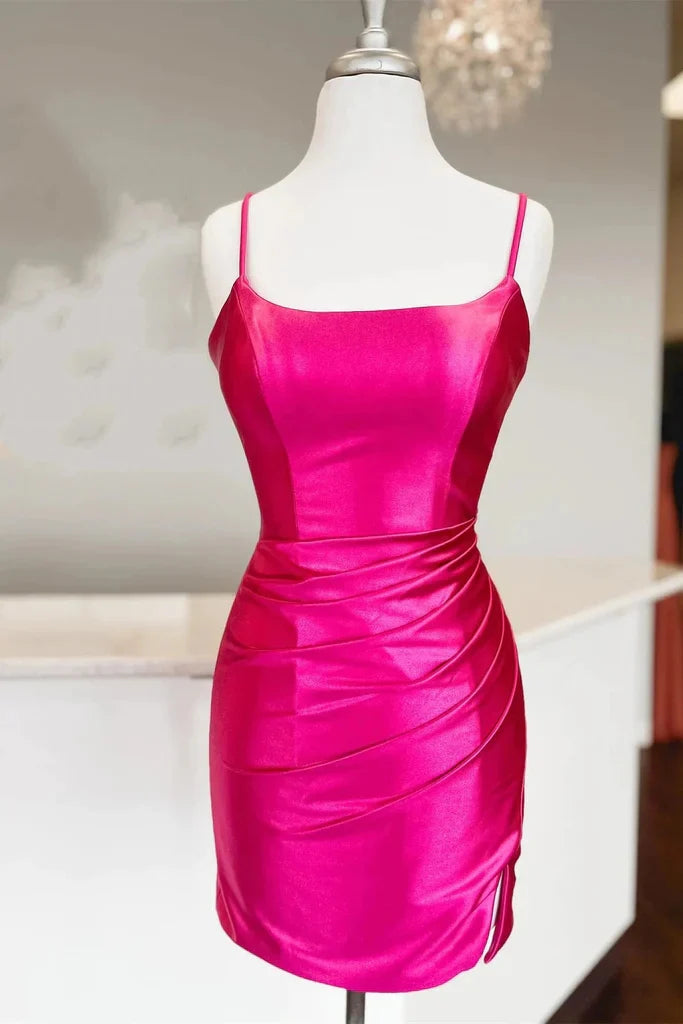 Back view of fuchsia ruched bodycon satin mini dress.