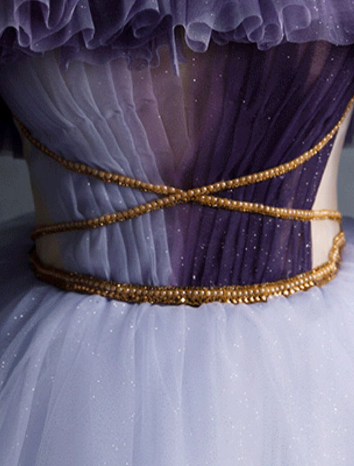 Girl posing in a purple off-shoulder short sleeve A-line dress.