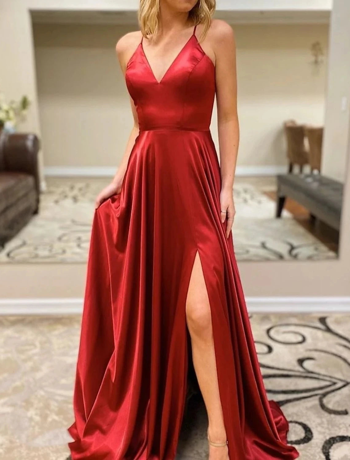 Full length view of the A-line V-neck gown, perfect for formal events.