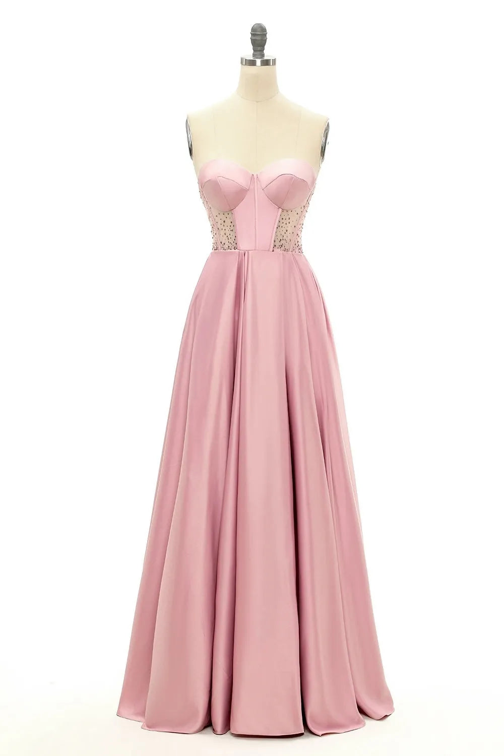 Model wearing a long A-line sweetheart beaded prom dress, full length.
