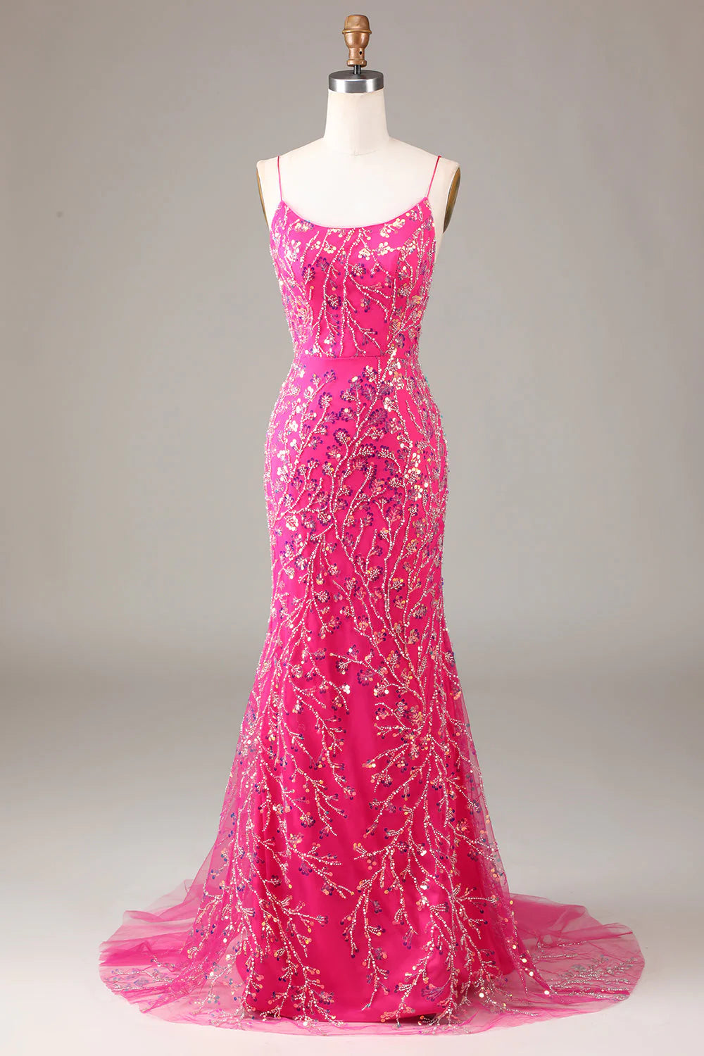 Fuchsia backless mermaid prom gown, front view.