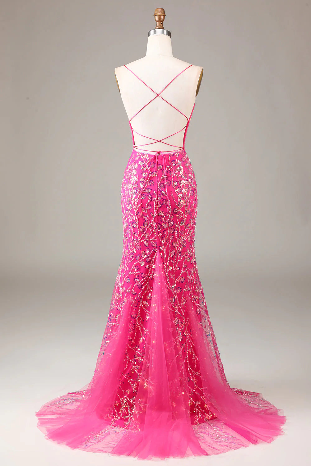Elegant fuchsia mermaid dress, side view.