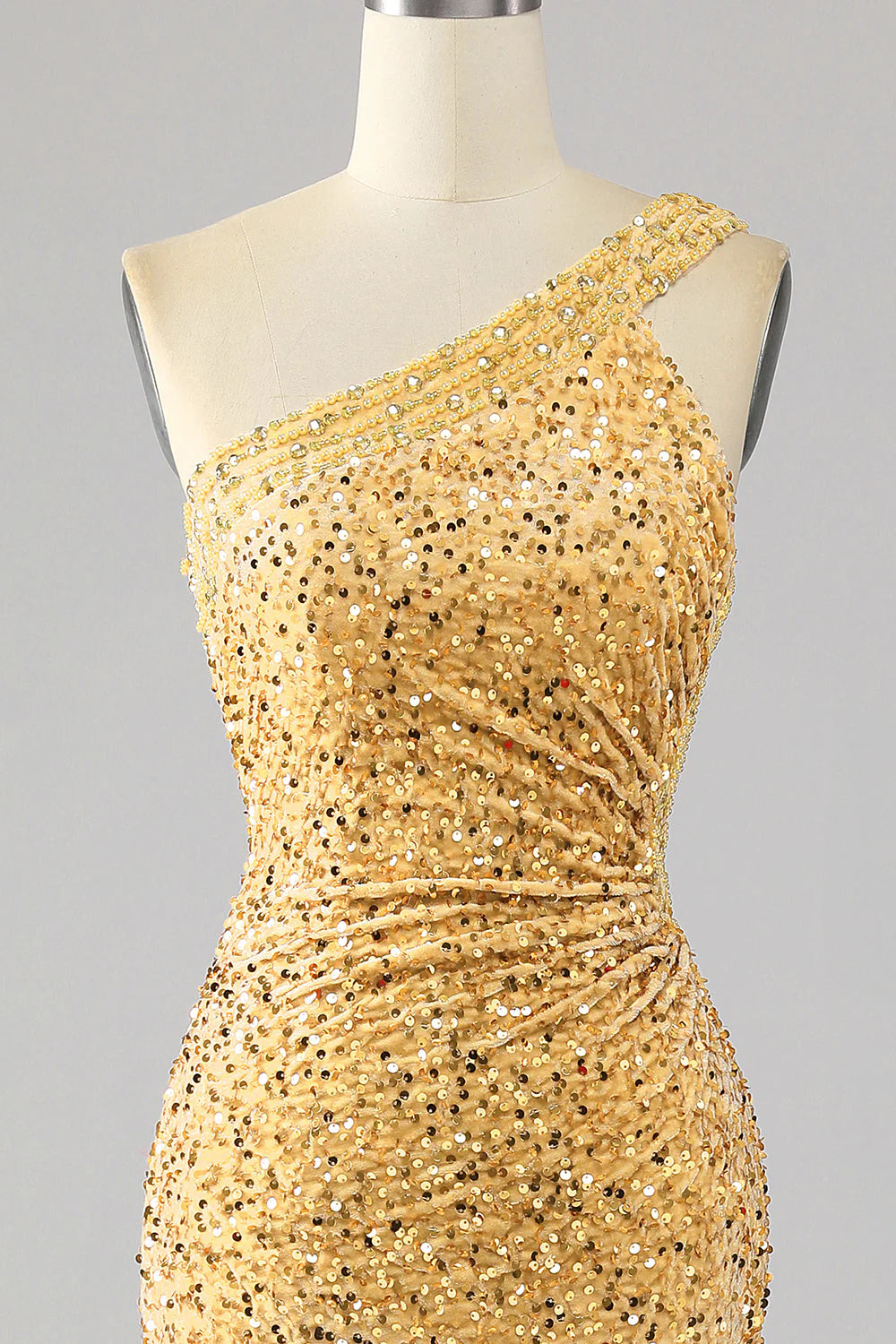 Full length view of a golden mermaid sequin prom dress with a side slit, perfect for formal occasions.