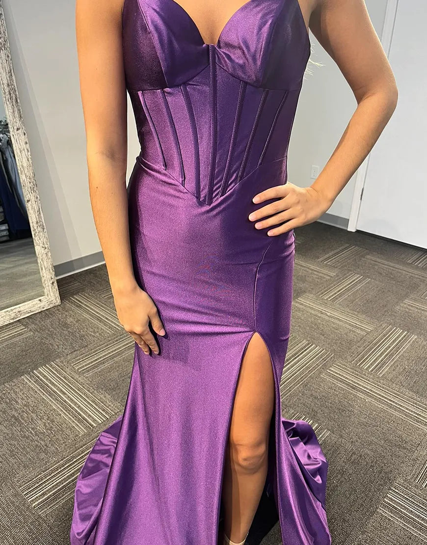 Close-up of the corset bodice and double spaghetti straps on a purple dress.