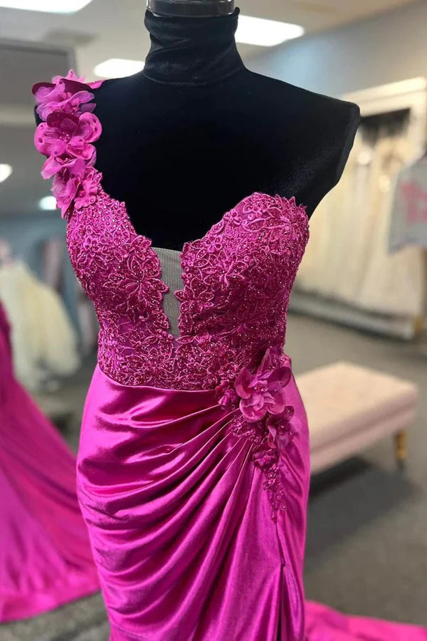 Back view of the red mermaid one-shoulder prom gown, showing the elegant silhouette.