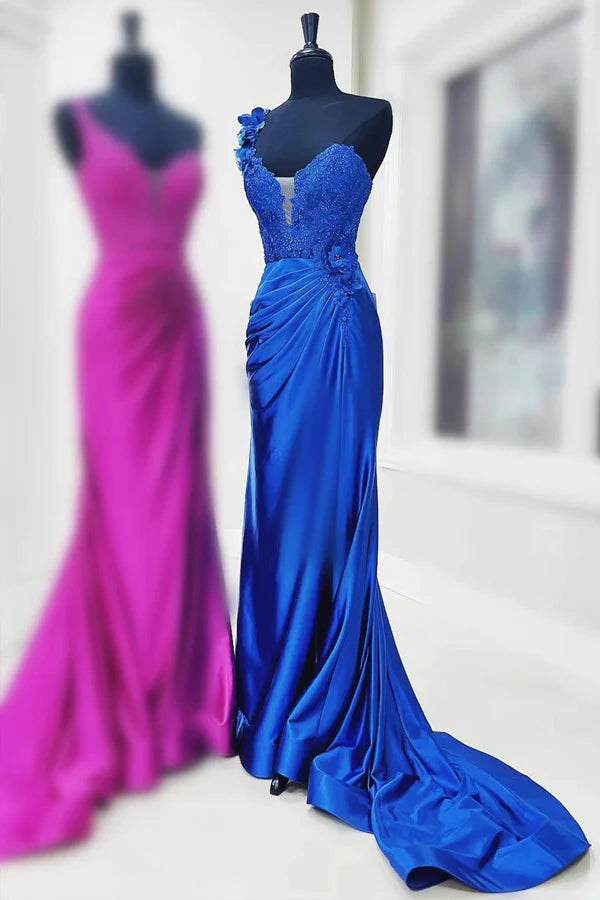 Close-up of the 3D floral lace and pleated detail on the red mermaid prom gown.