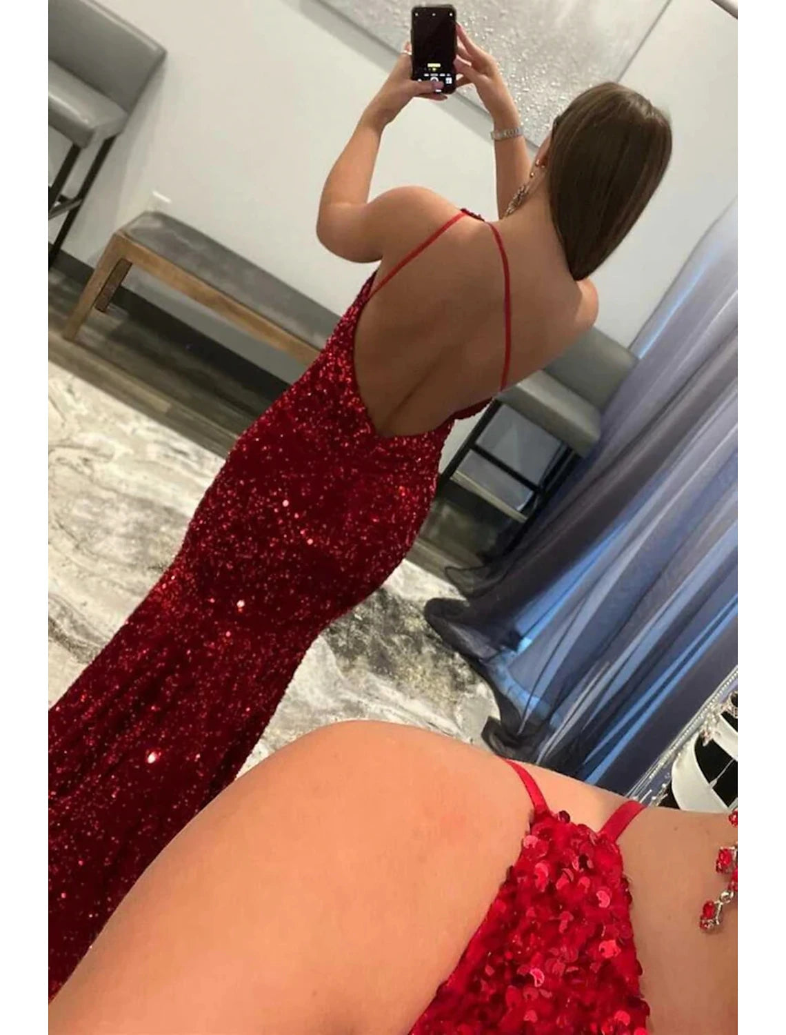 Back view of a sequined one-shoulder mermaid prom dress, showcasing the elegant backless design.