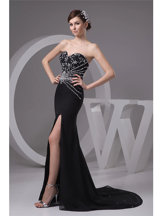Close-up of the sweetheart neckline and intricate beading on the chiffon gown.