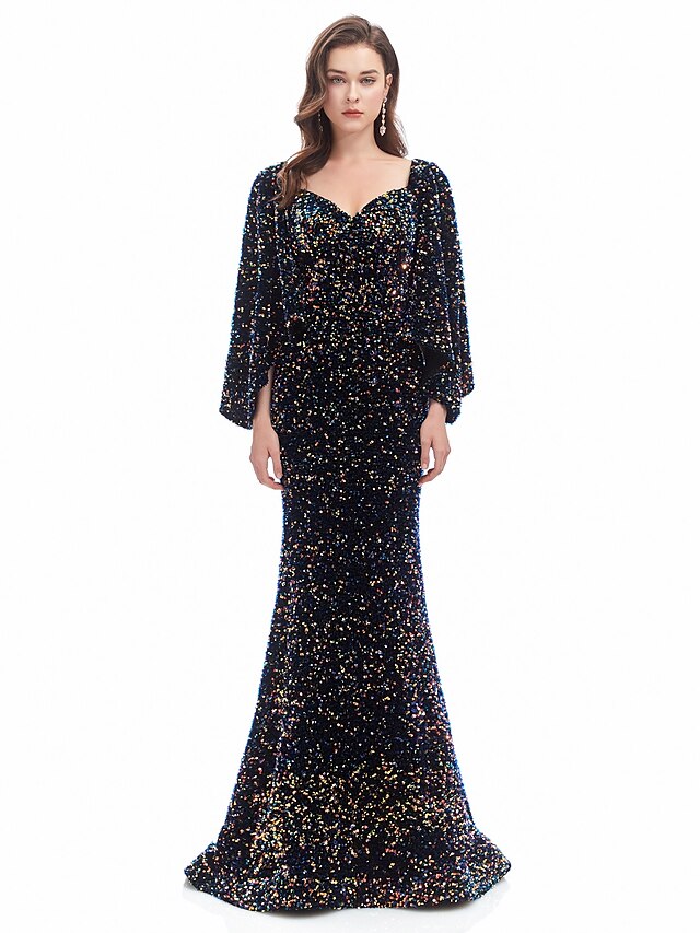 Close-up of the sequin detail on the long sleeve sweetheart evening gown.