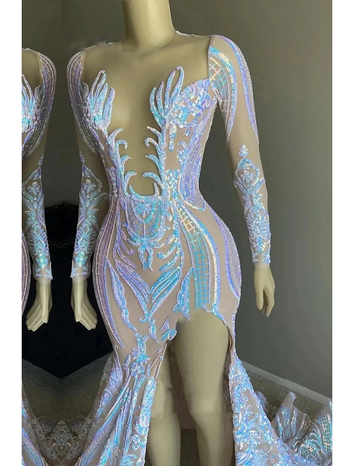 Side view of the sequined mermaid formal dress with a chapel train.