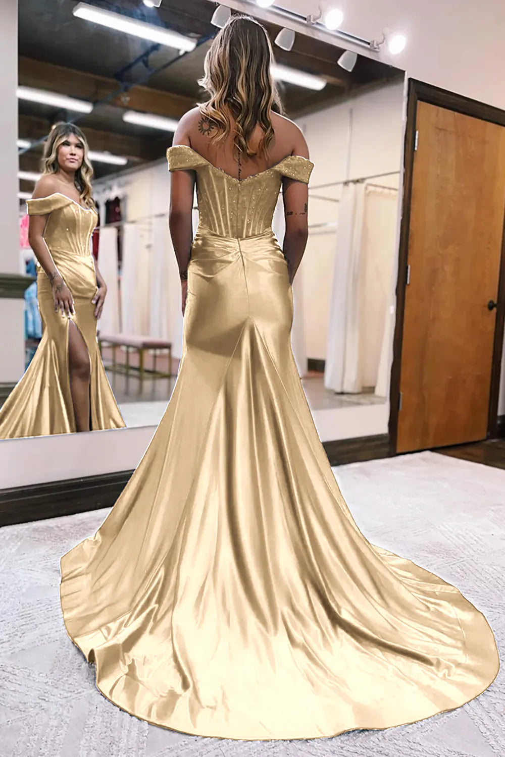 Side view of a model showcasing a gold off-shoulder mermaid gown.
